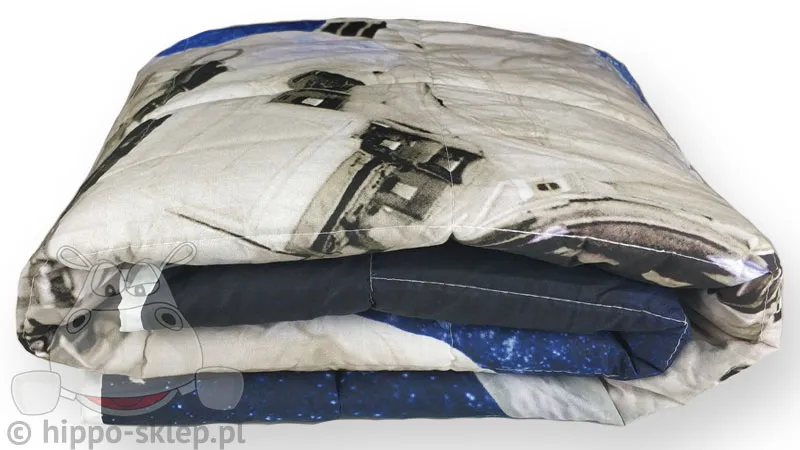 Nakrycie na łóżko z astronautą w kosmosie